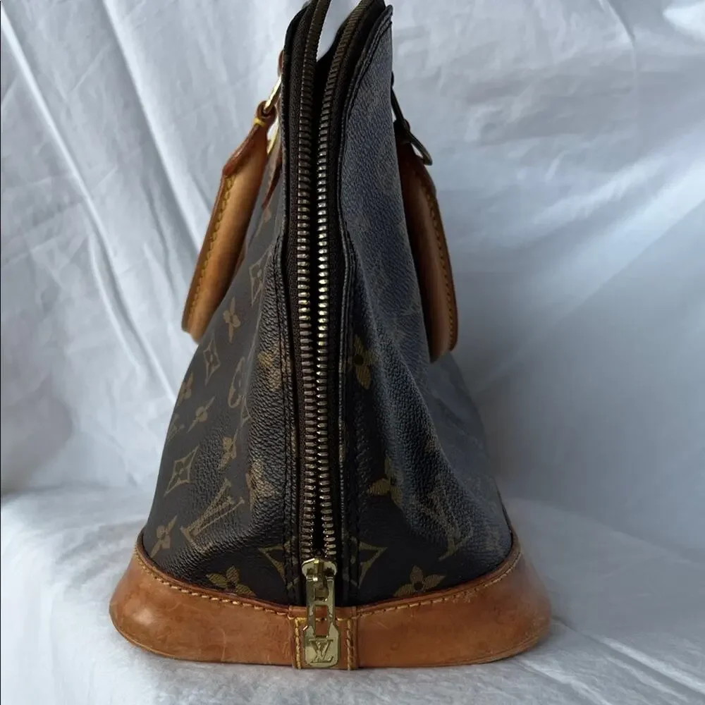 Louis Vuitton Alma PM Monogram Handbag